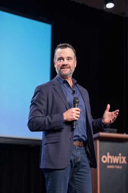 Craig W. Irwin speaking at a conference